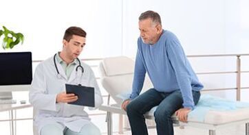 the doctor speaks to the patient